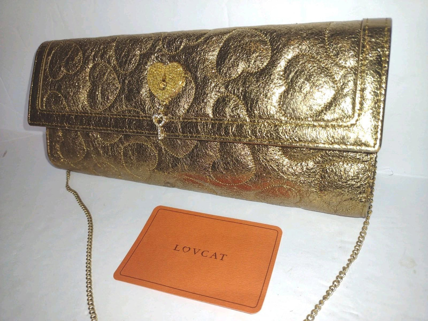 Lovcat Gold Heart Embossed Chain Clutch Wallet NWOT Pink Heart Lining Charm